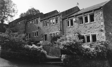 5 stone built mews townhouses built over looking the town of Hebden Bridge.